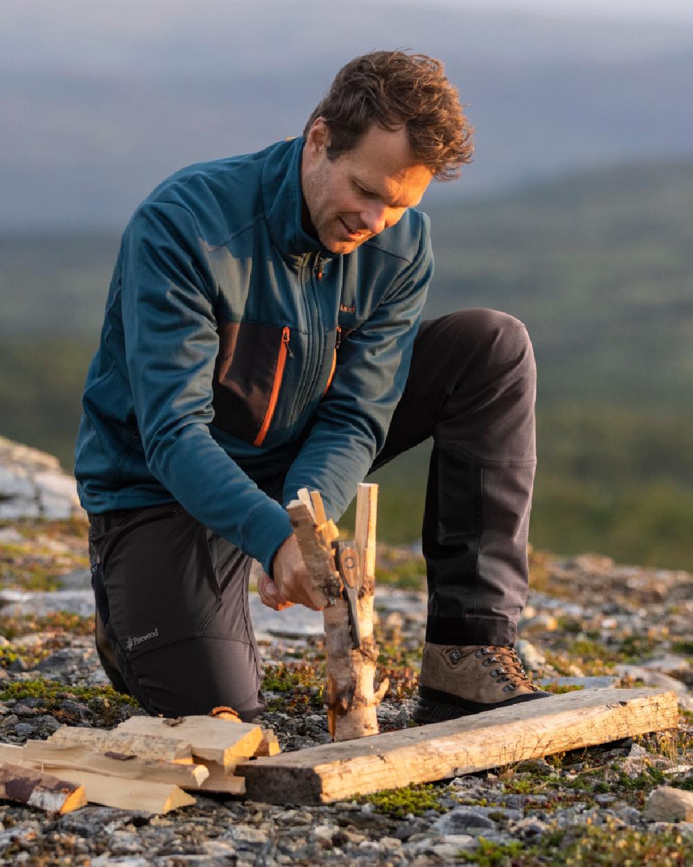 Black Coloured Pinewood Mens Abisko Adventure Trousers on outdoor background