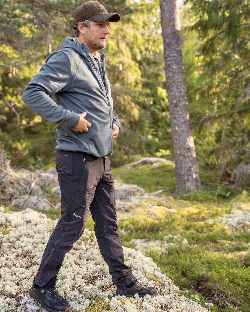 Black Coloured Pinewood Mens Abisko Adventure Trousers on outdoor background
