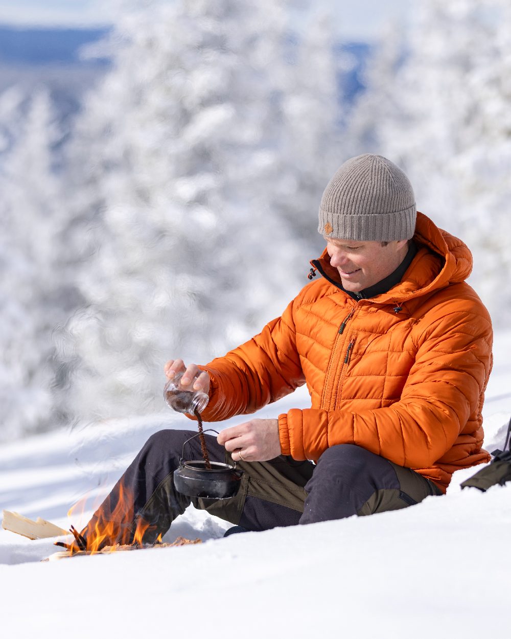 Moss Green Coloured Pinewood Mens Abisko Adventure Trousers on snow background