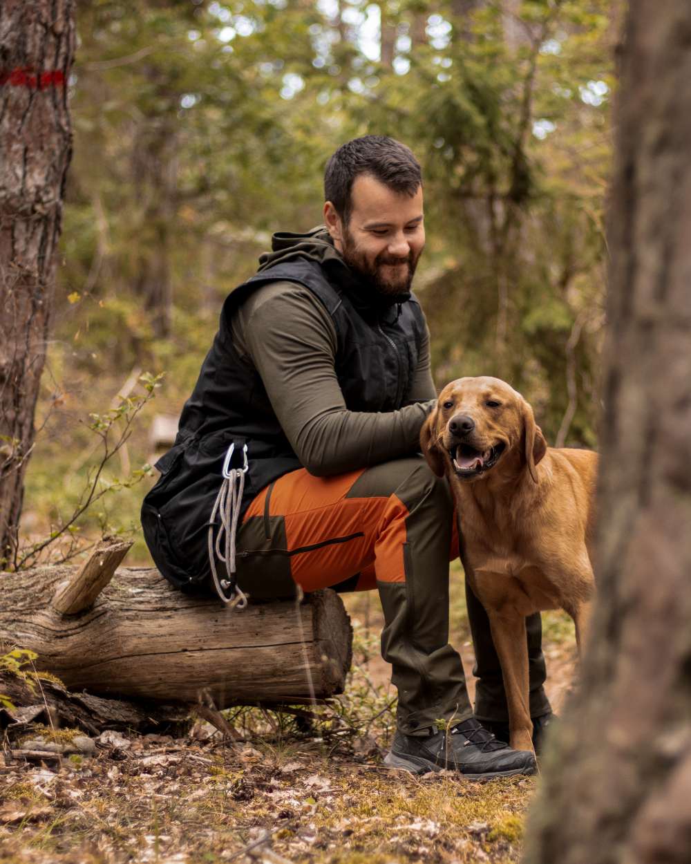Burned Orange Mossgreen Coloured Pinewood Mens Abisko Brenton Trousers on outdoor background
