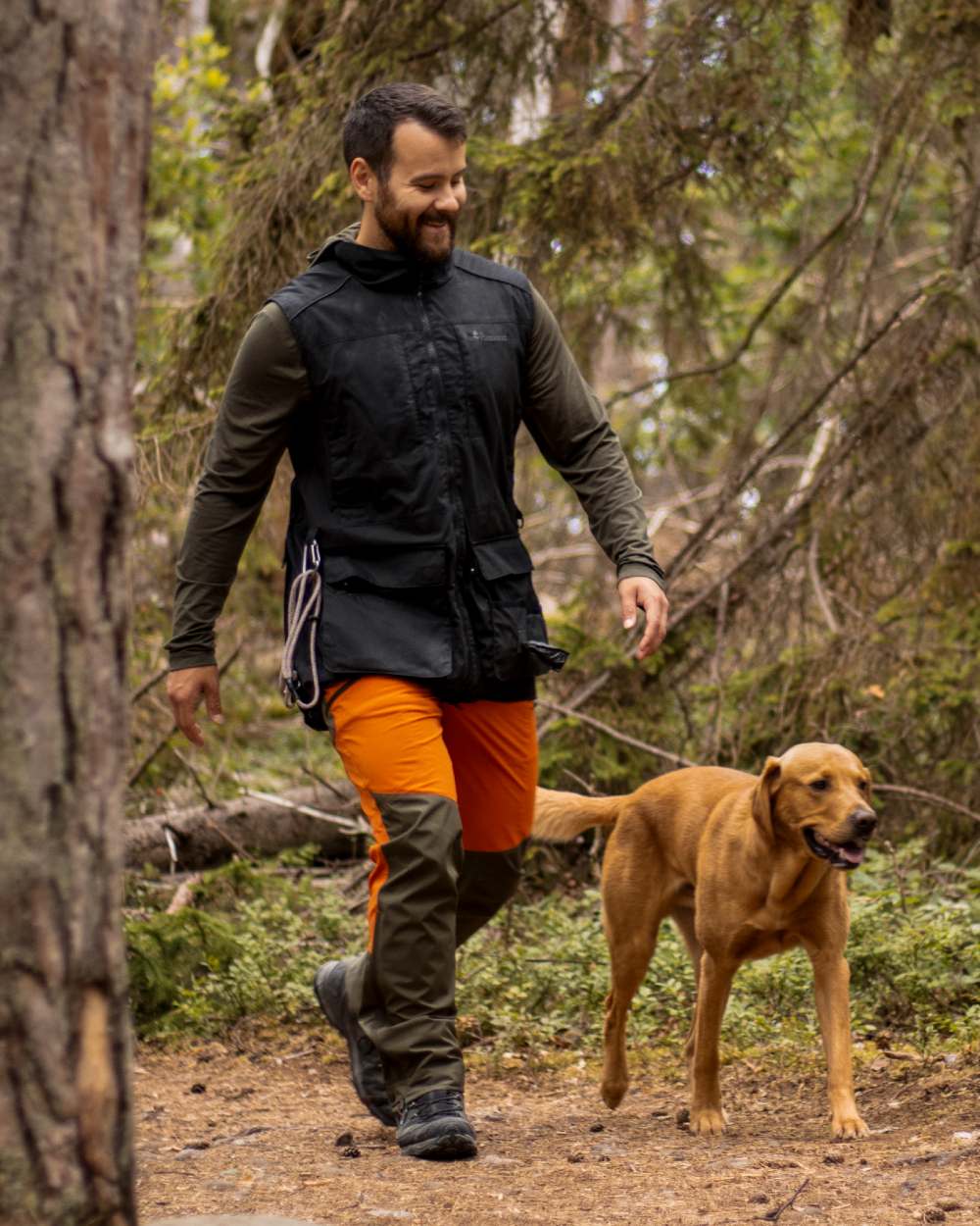 Burned Orange Mossgreen Coloured Pinewood Mens Abisko Brenton Trousers on outdoor background