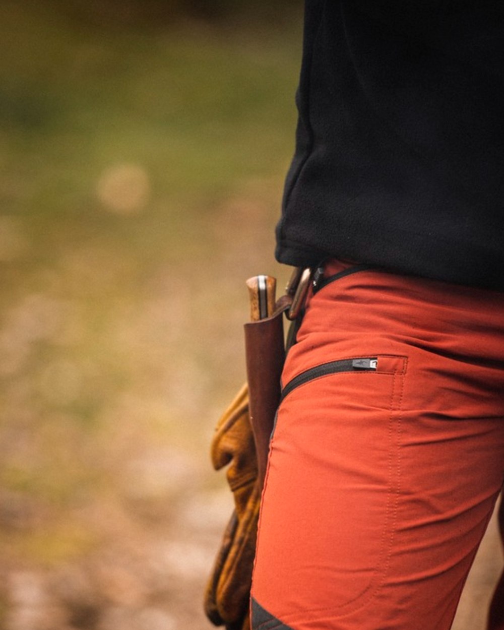 Terracotta Dark Anthracite Coloured Pinewood Mens Abisko Brenton Trousers on outdoor background