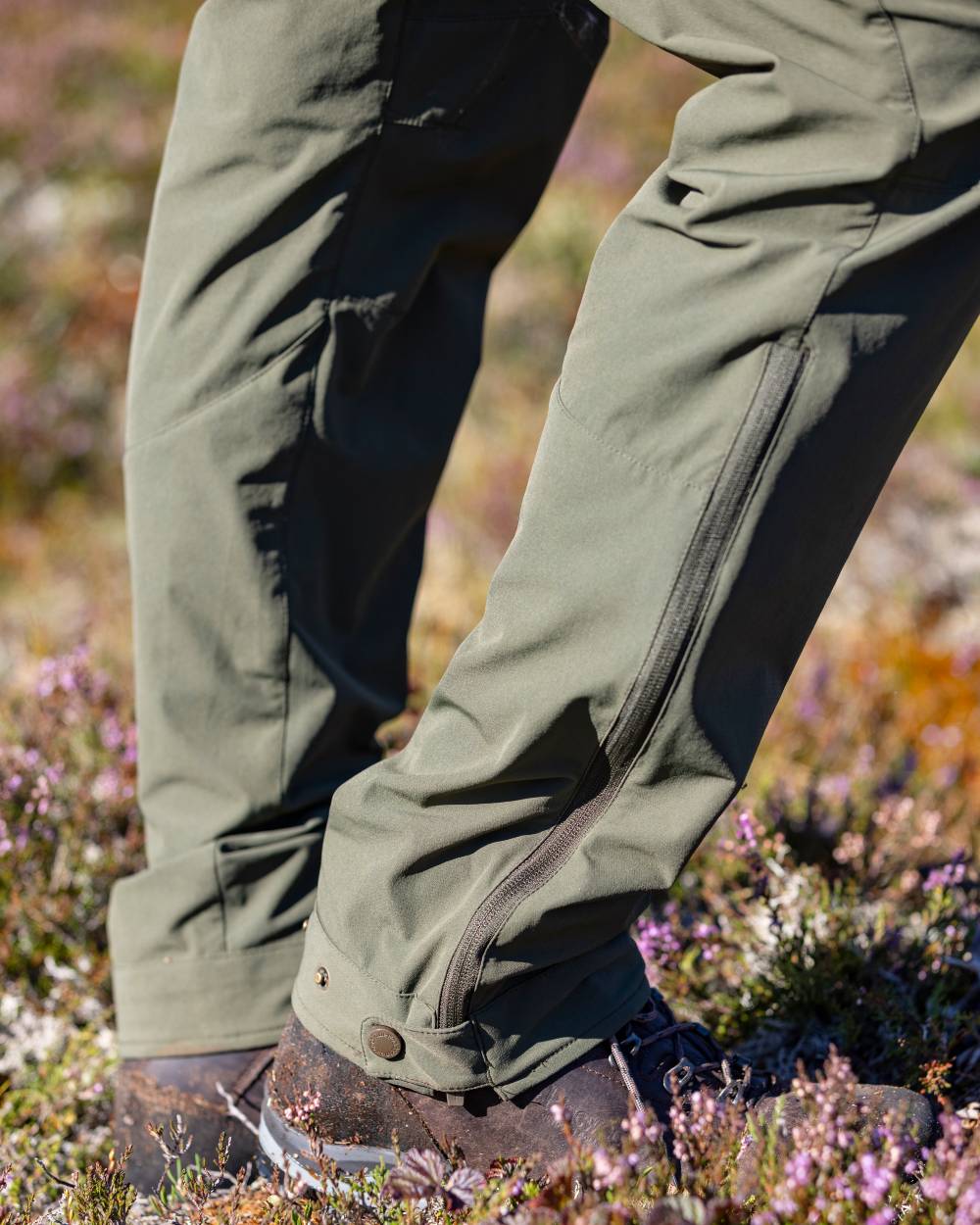 Mossgreen Coloured Pinewood Mens Abisko Light Stretch Trousers on outdoor background