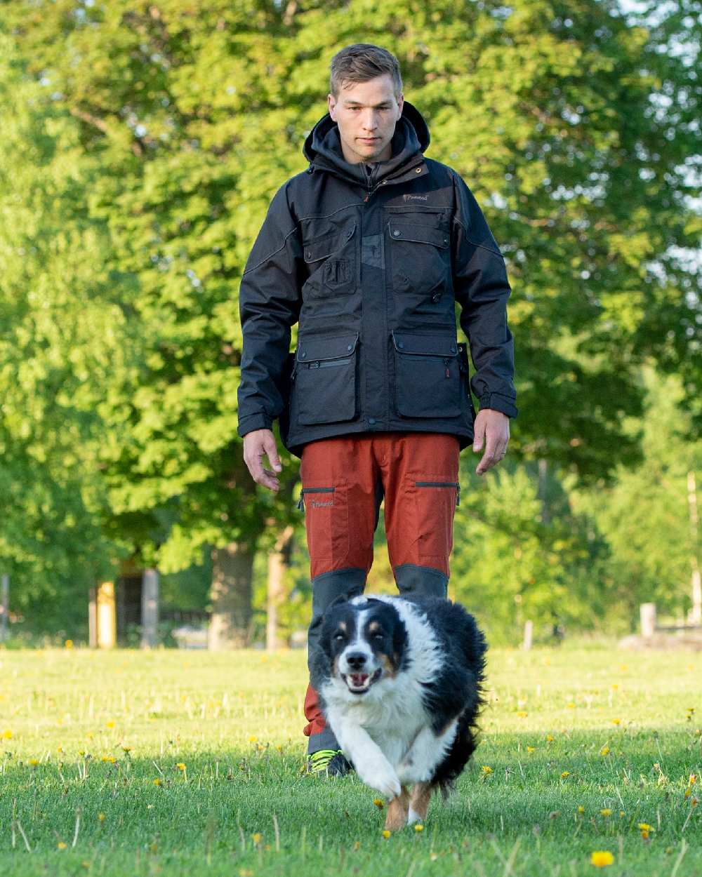 Terracotta Grey Coloured Pinewood Mens Caribou TC-Lite Trousers on outdoor background