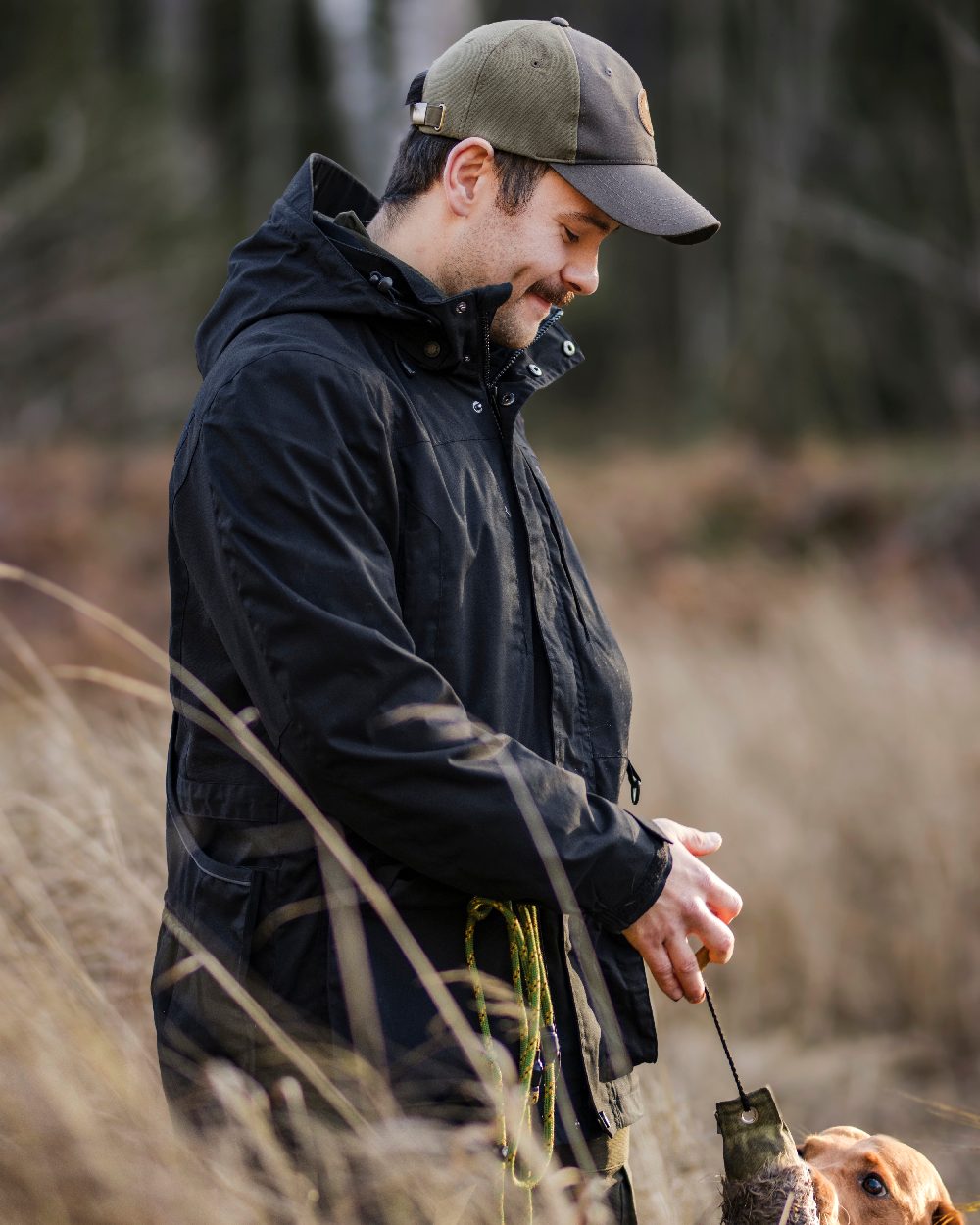 Black Coloured Pinewood Mens Dog Sports Trainer Extreme Jacket on outdoor background