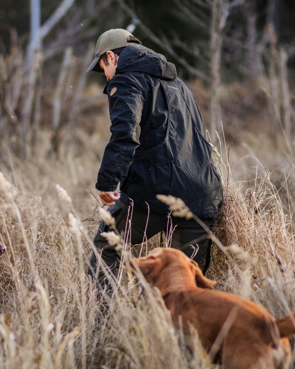 Black Coloured Pinewood Mens Dog Sports Trainer Extreme Jacket on outdoor background