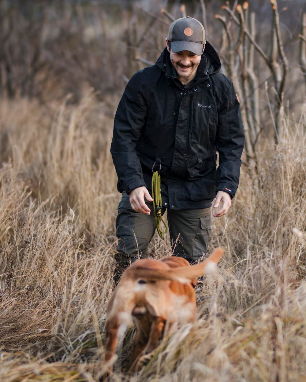Black Coloured Pinewood Mens Dog Sports Trainer Extreme Jacket on outdoor background