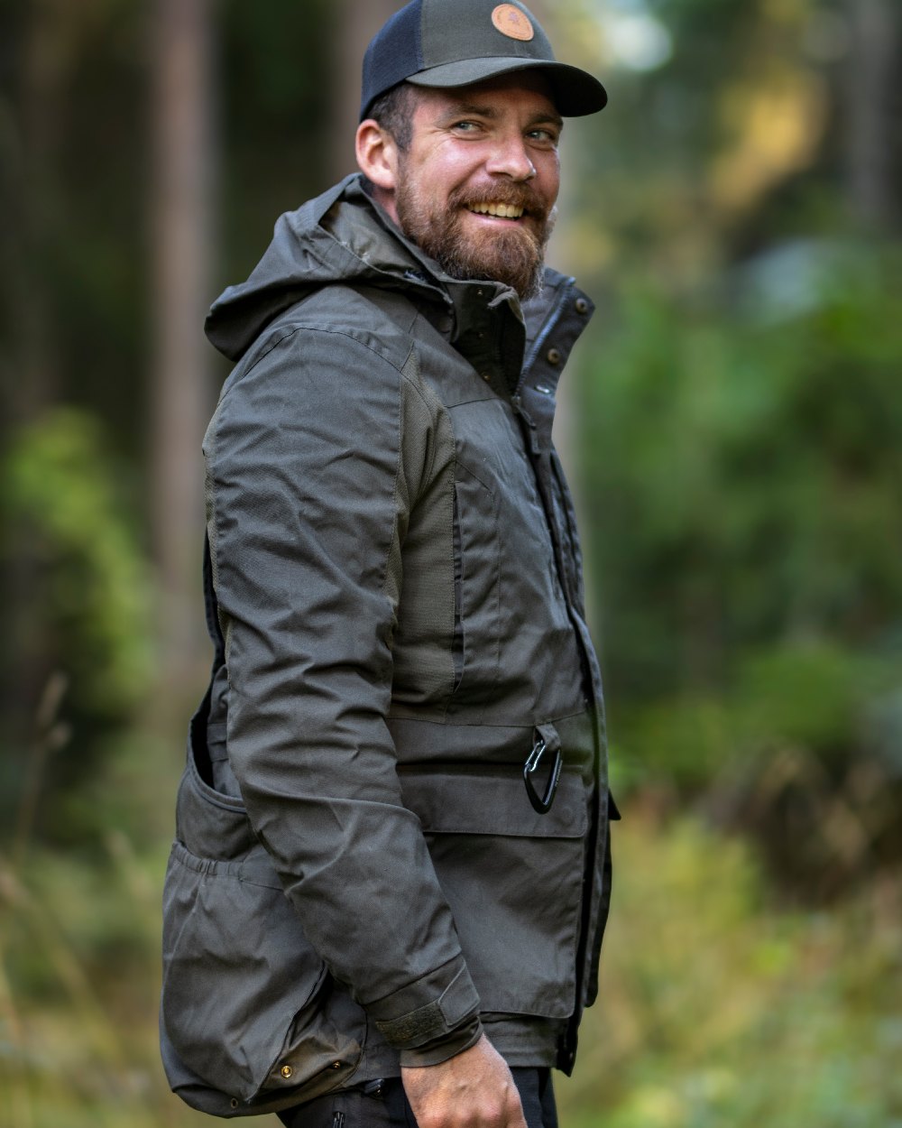 Moss Green Coloured Pinewood Mens Dog Sports Trainer Jacket on outdoor background