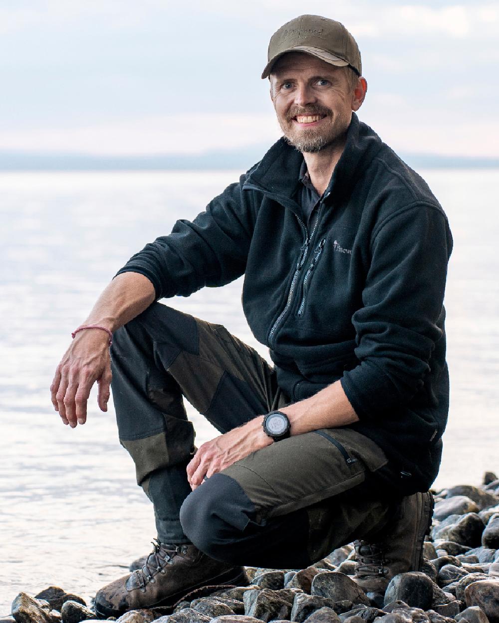 Black Coloured Pinewood Mens Finnveden Fleece Jacket on outdoor background