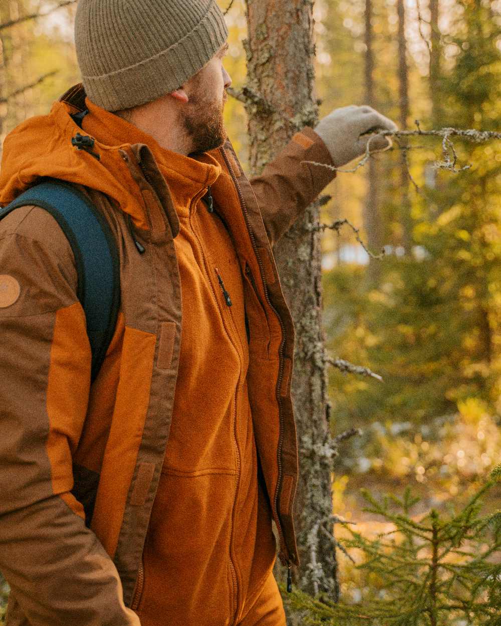 Fudge Nougat Coloured Pinewood Mens Finnveden Hybrid Extreme Jacket on forest background