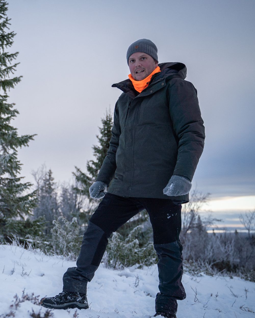 Black Dark Anthracite Coloured Pinewood Mens Finnveden Hybrid Extreme Trousers on snow background