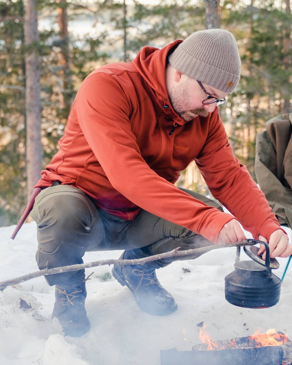 Hunting Olive Coloured Pinewood Mens Finnveden Hybrid Trousers on outdoor background
