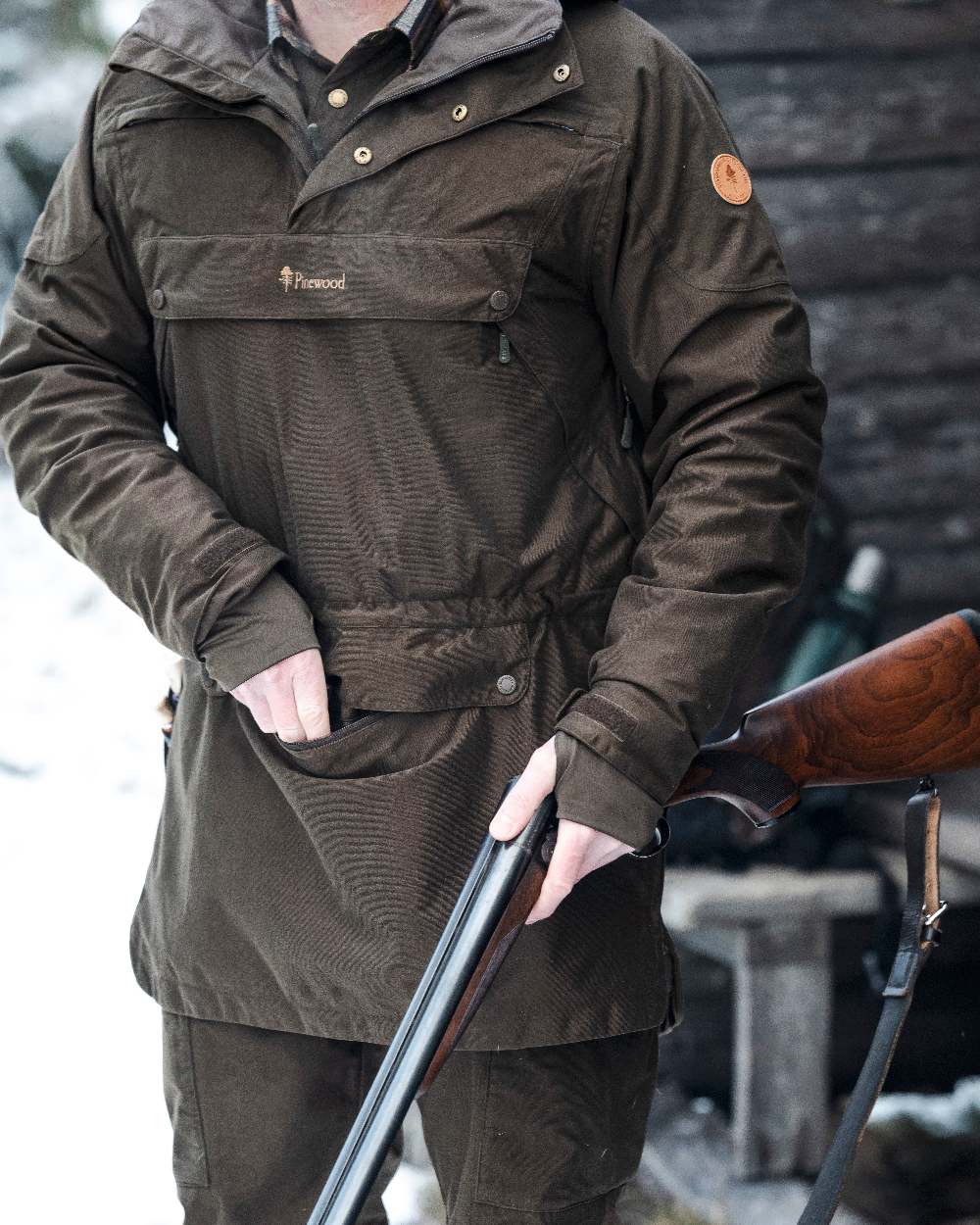 Suede Brown Coloured Pinewood Mens Furudal Hunters 2L Anorak on snow background