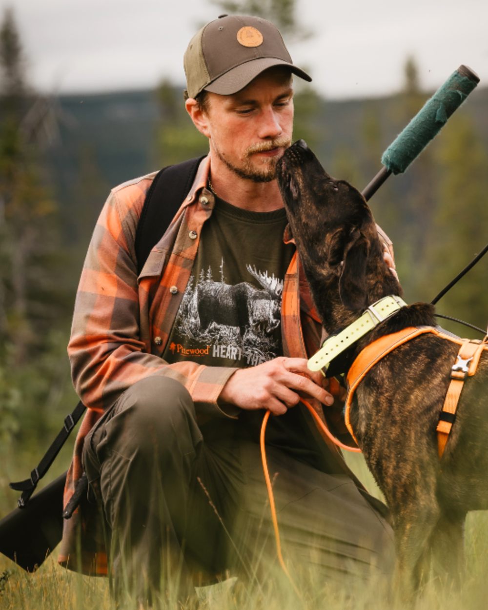 Green coloured Pinewood Mens Moose T-Shirt on forest background
