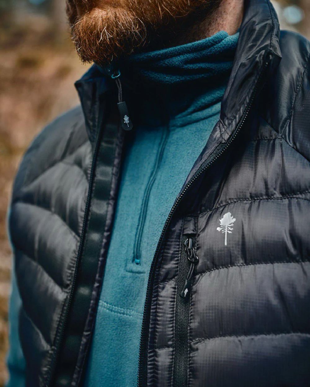 Atlantic Blue coloured Pinewood Mens Tiveden Fleece Sweater on blurry background