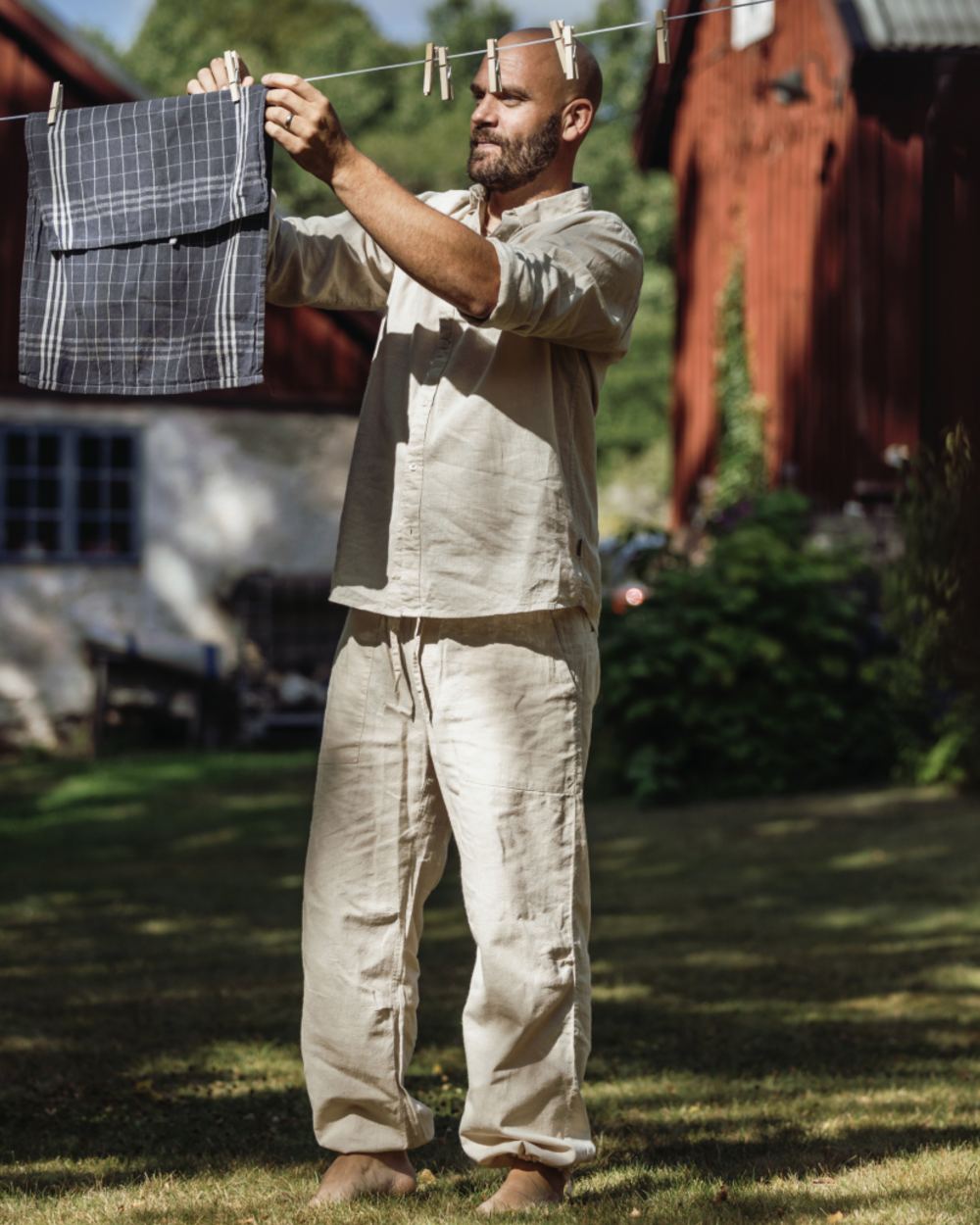 Linen Beige coloured Pinewood Mens Varnamo InsectSafe Hemp Mix Trousers on outdoor background