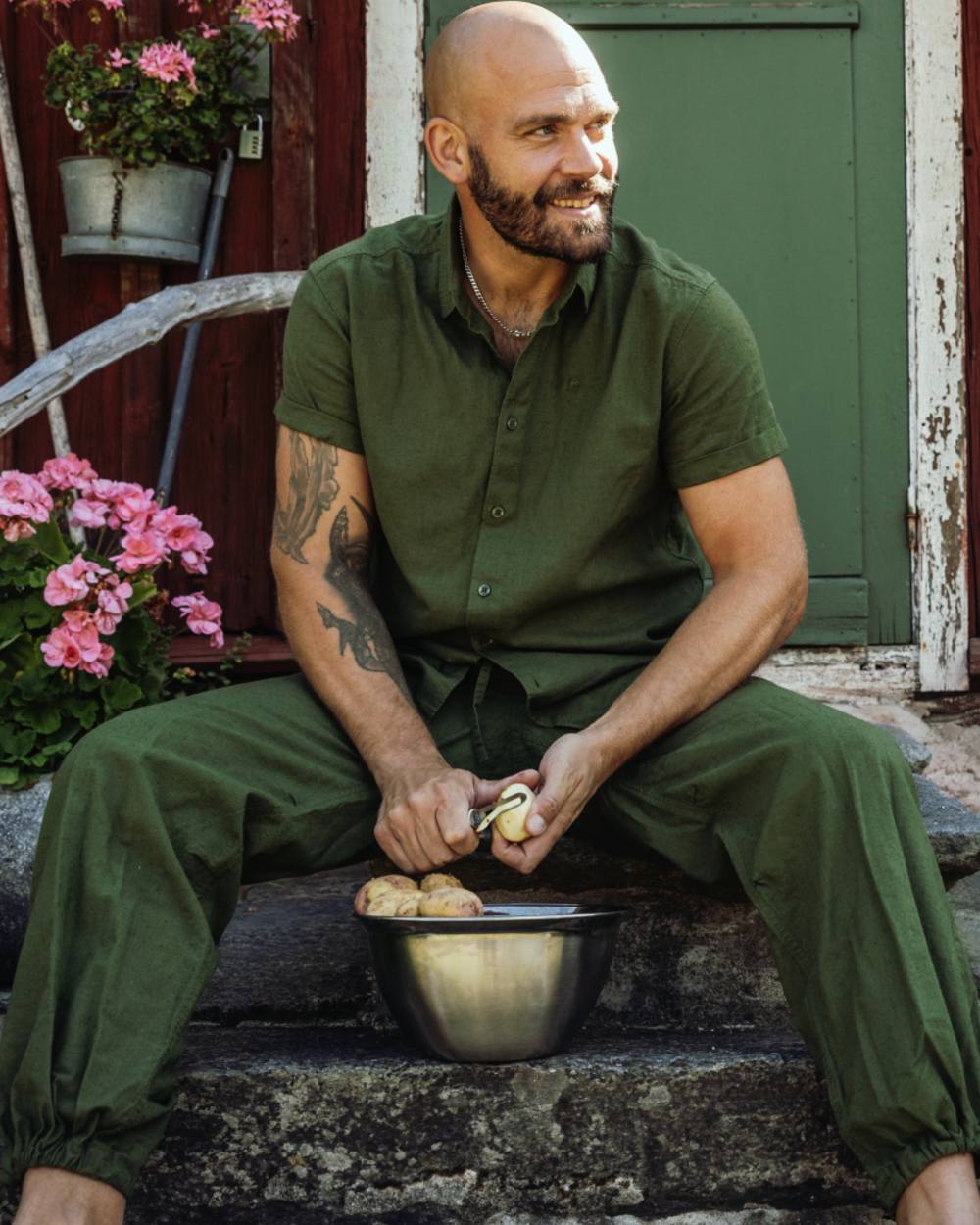 Pine Green coloured Pinewood Mens Varnamo InsectSafe Hemp Mix Trousers on outdoor background