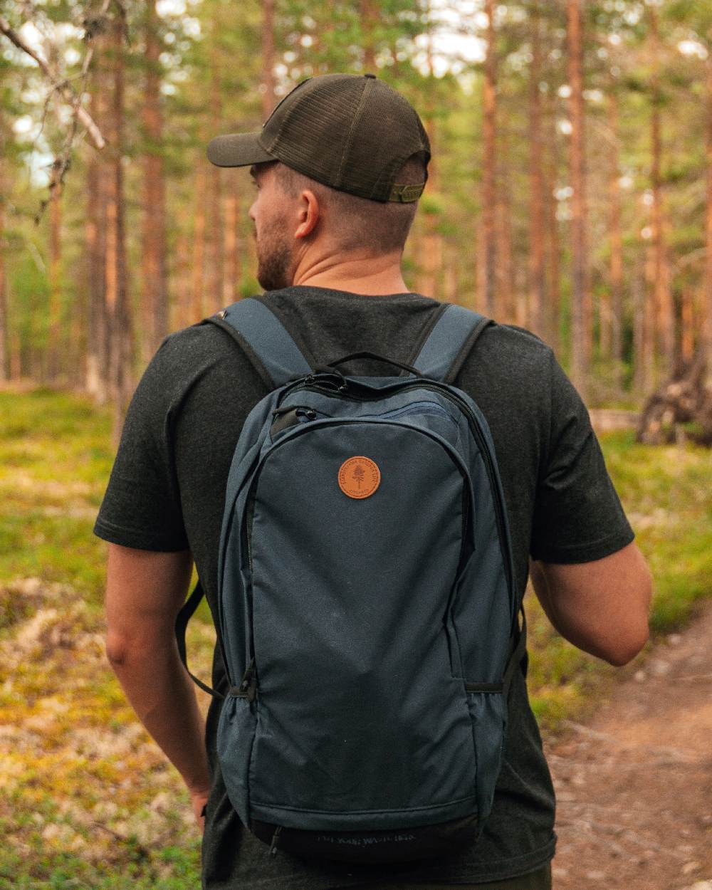 Moss Green Coloured Pinewood Mesh Cap on outdoor background