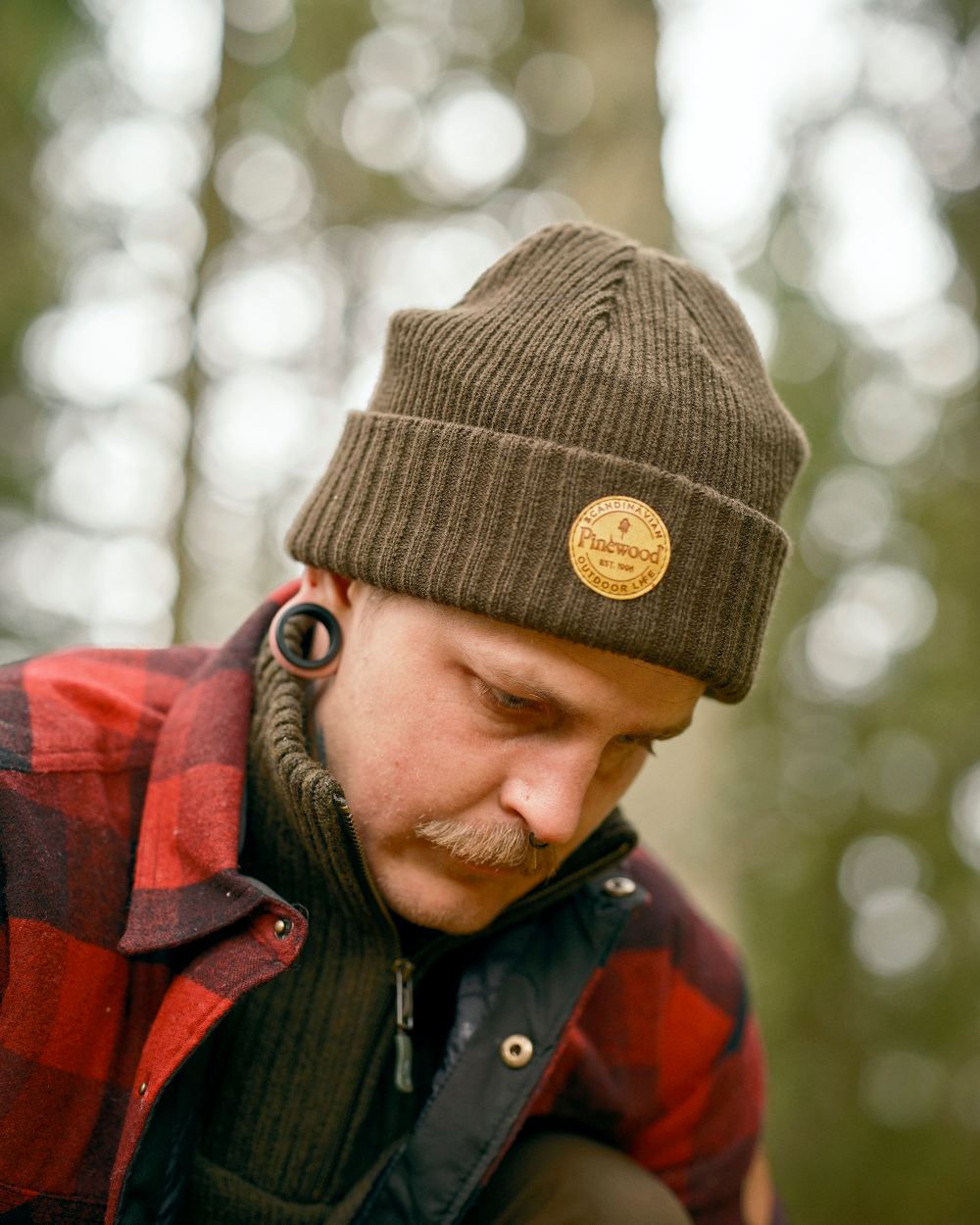 Moss Green Coloured Pinewood Windy Hat on outdoor background