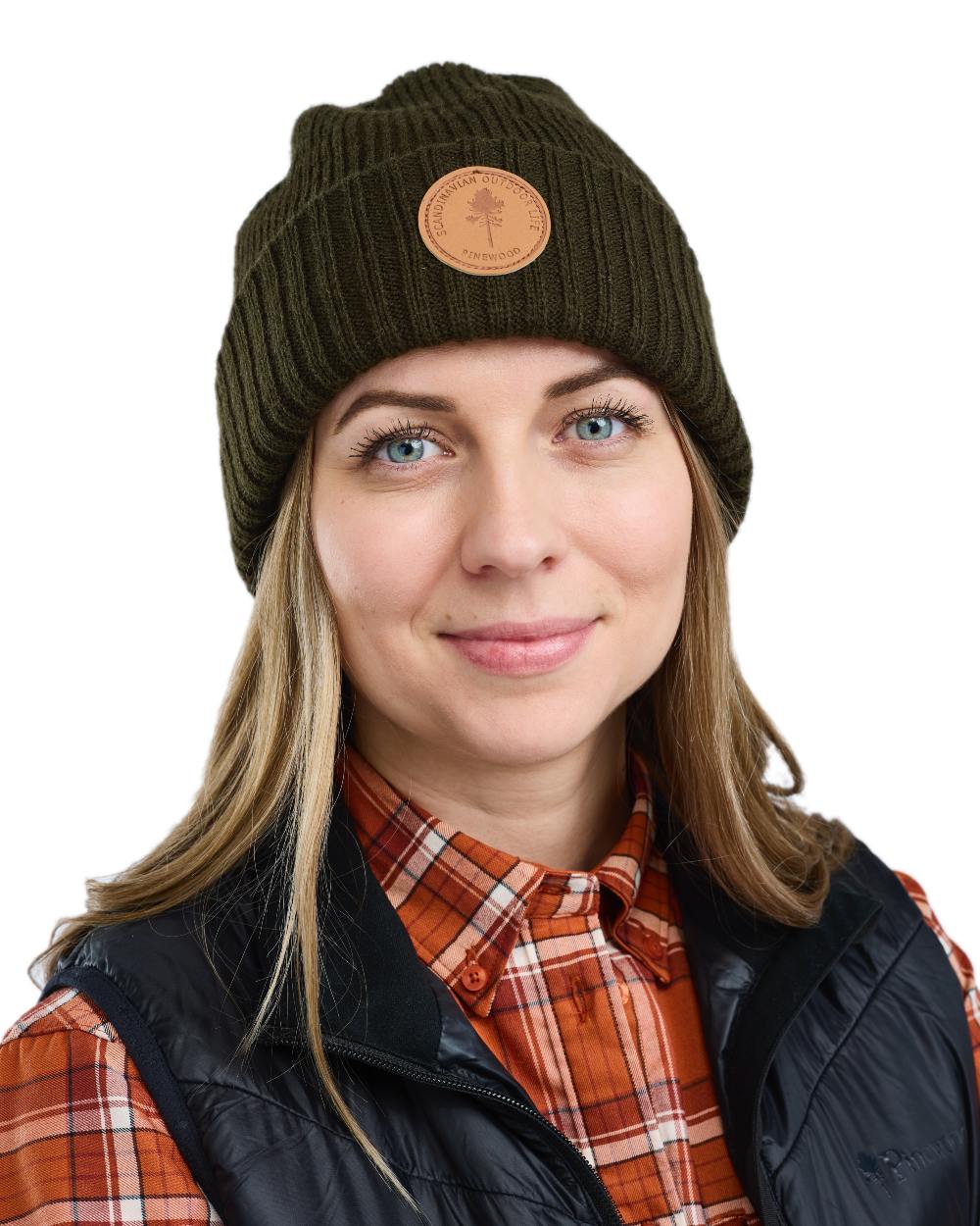 Moss Green Coloured Pinewood Windy Hat on white background