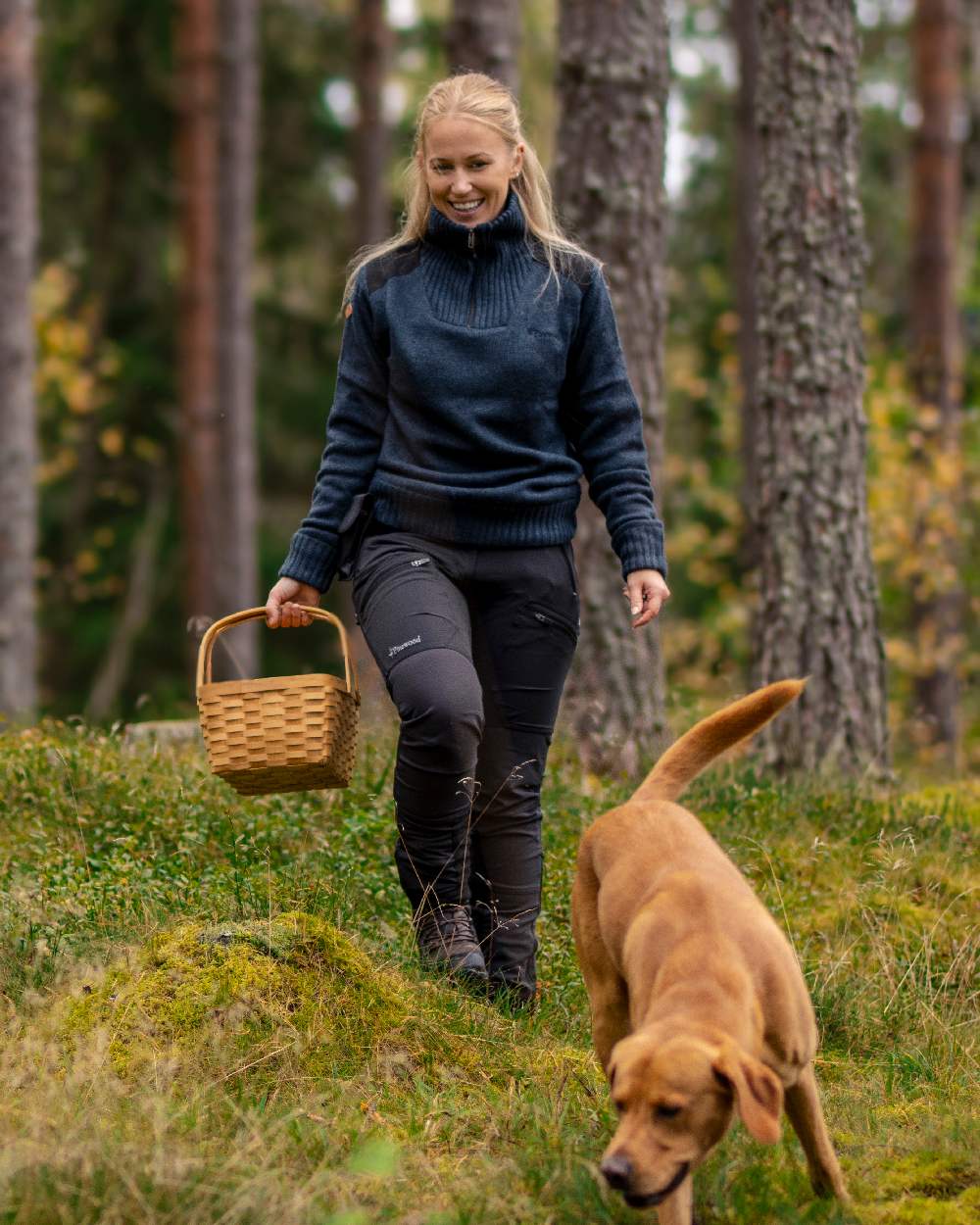 Black Coloured Pinewood Womens Abisko Adventure Trousers on forest background