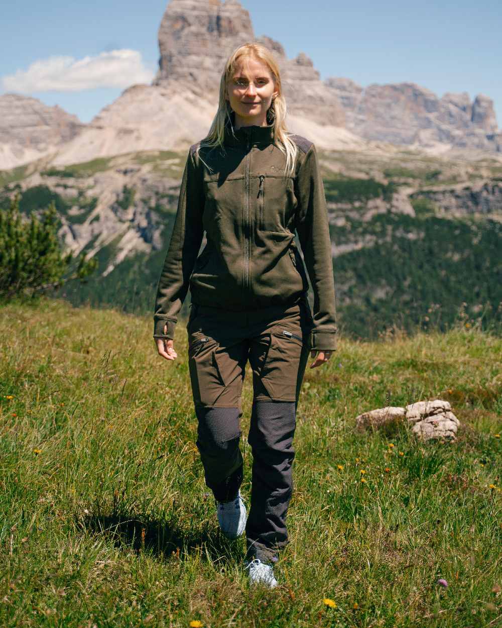 Moss Green Coloured Pinewood Womens Abisko Adventure Trousers on mountain background
