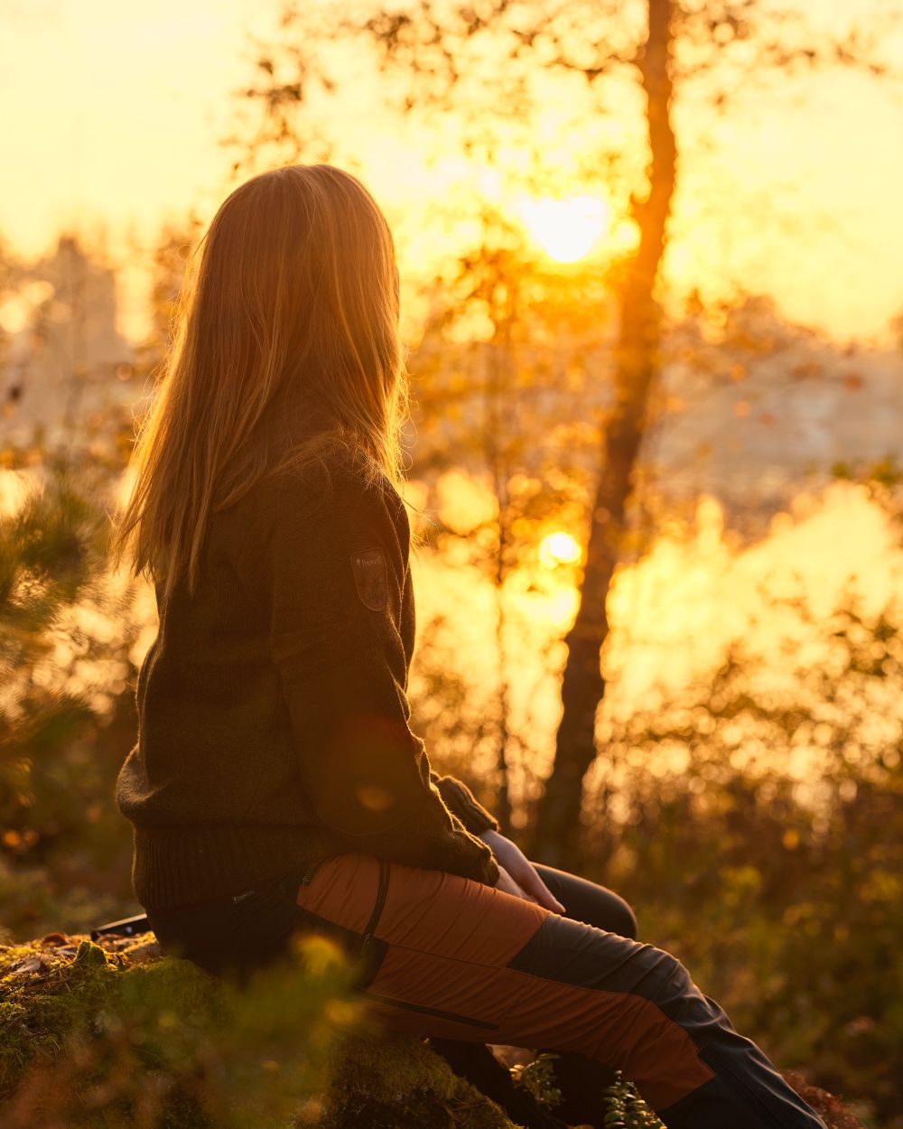 Terracotta Dark Anthracite Coloured Pinewood Womens Abisko Brenton Trousers on forest background