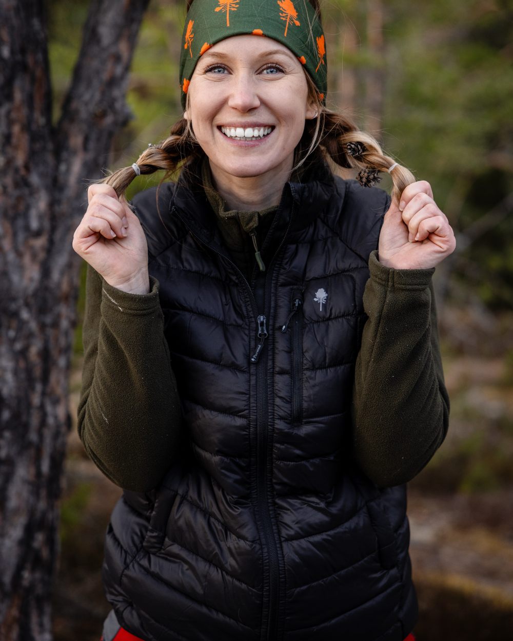 Black Coloured Pinewood Womens Abisko Insulation Vest on forest background