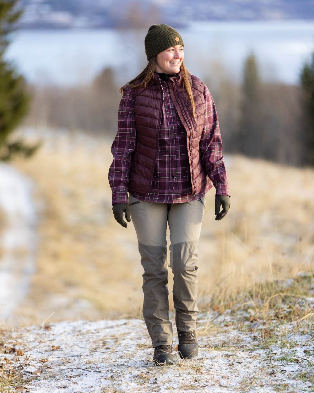Earth Plum Coloured Pinewood Womens Abisko Insulation Vest on outdoor background