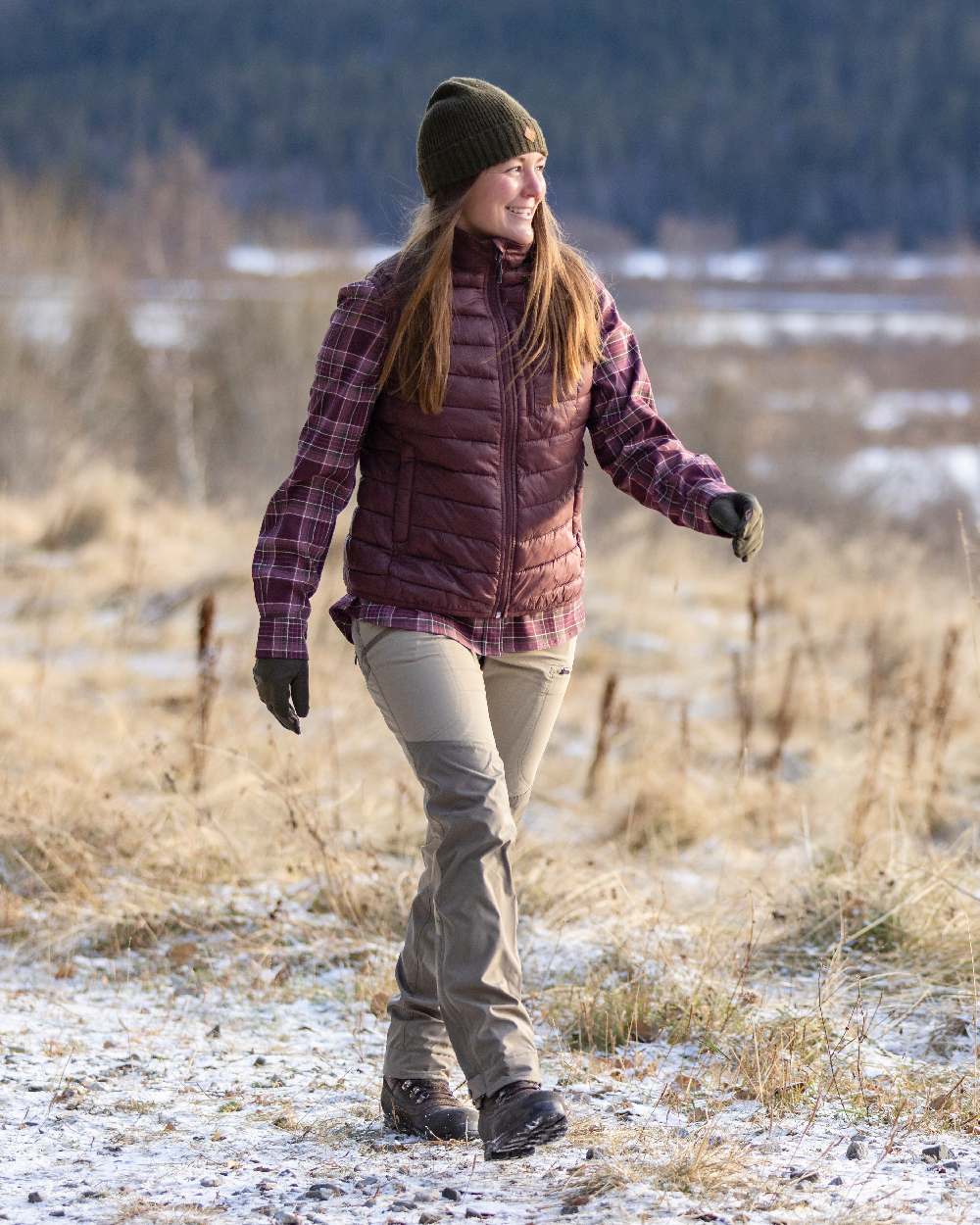 Earth Plum Coloured Pinewood Womens Abisko Insulation Vest on outdoor background