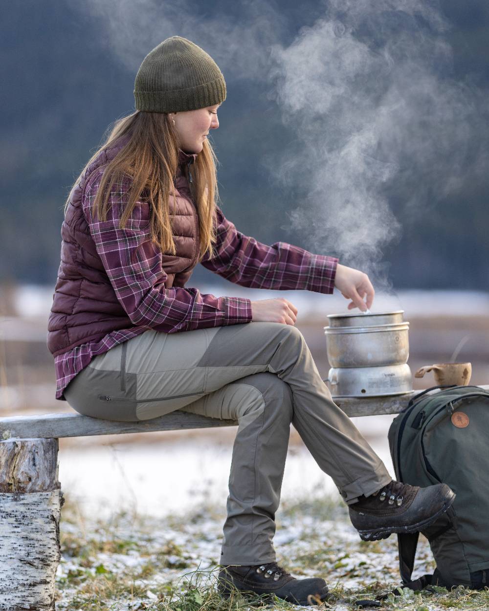 Earth Plum Coloured Pinewood Womens Abisko Insulation Vest on outdoor background