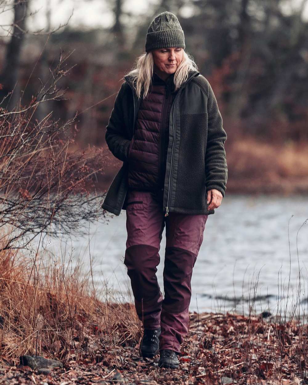Earth Plum Coloured Pinewood Womens Abisko Insulation Vest on outdoor background