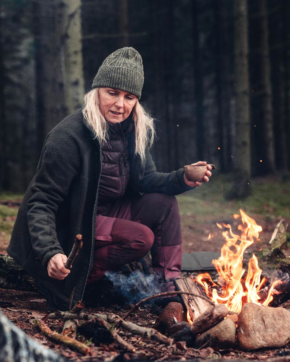 Earth Plum Coloured Pinewood Womens Abisko Insulation Vest on outdoor background