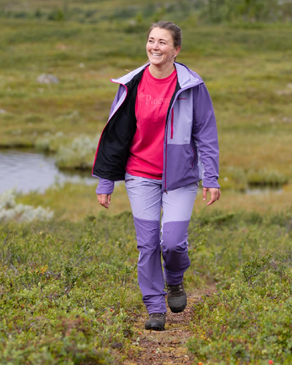 Light Lilac Coloured Pinewood Womens Abisko Light Stretch Jacket on outdoor background