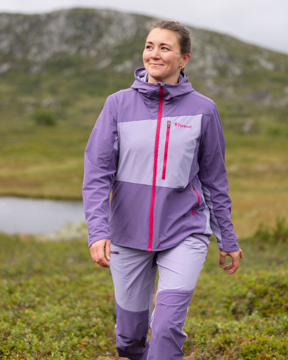 Light Lilac Coloured Pinewood Womens Abisko Light Stretch Jacket on outdoor background