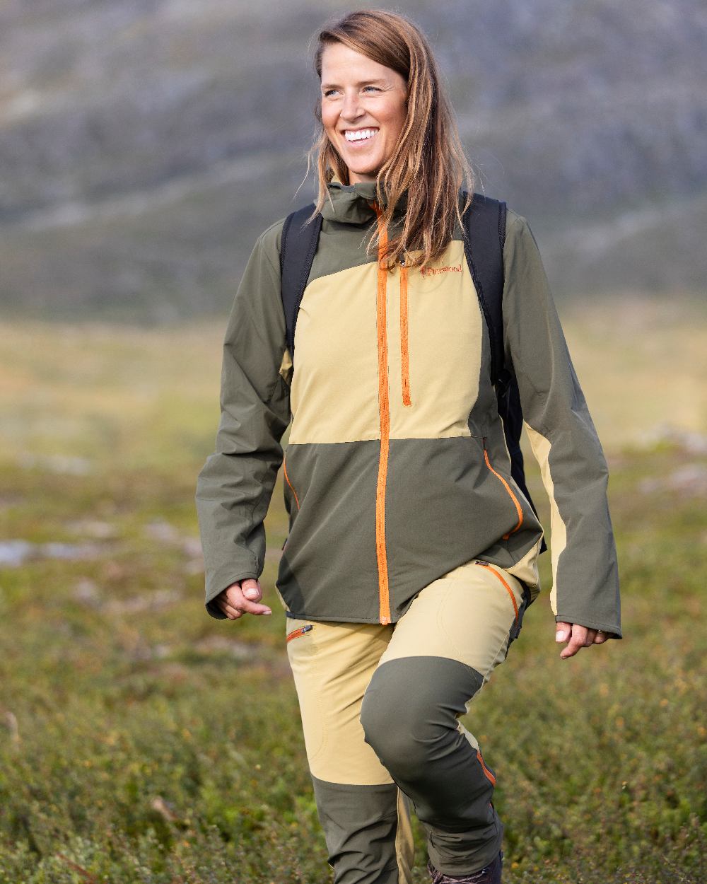 Golden Hay Mossgreen Coloured Pinewood Womens Abisko Light Stretch Trousers on outdoor background