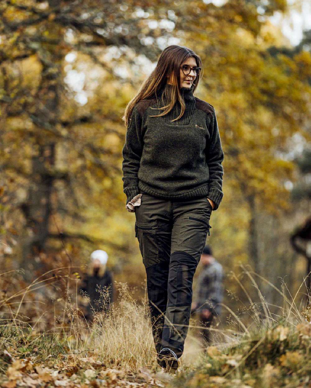 Moss Green Black coloured Pinewood Womens Caribou TC Trousers on forest background