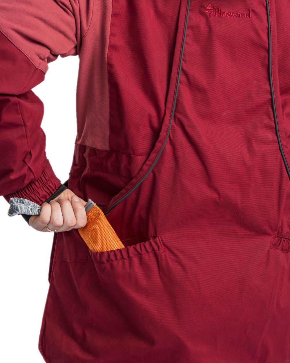Dark Tomato Dark Red Coloured Pinewood Womens Dog Sports Trainer Extreme Jacket on white background