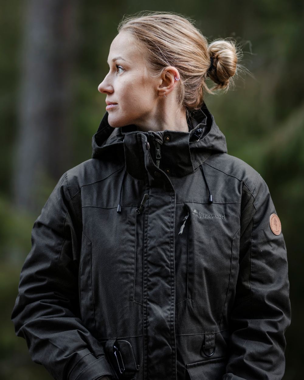 Moss Green Coloured Pinewood Womens Dog Sports Trainer Extreme Jacket on outdoor background