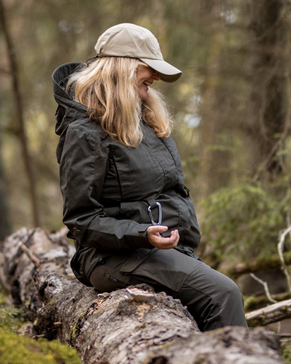 Moss Green Coloured Pinewood Womens Dog Sports Trainer Trousers on outdoor background