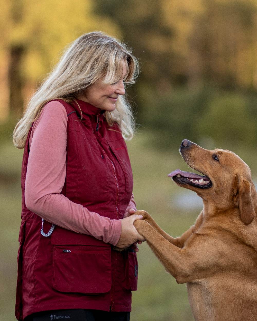 Dark Tomato Dark Red Coloured Pinewood Womens Dog Sports Trainer Vest on outdoor background