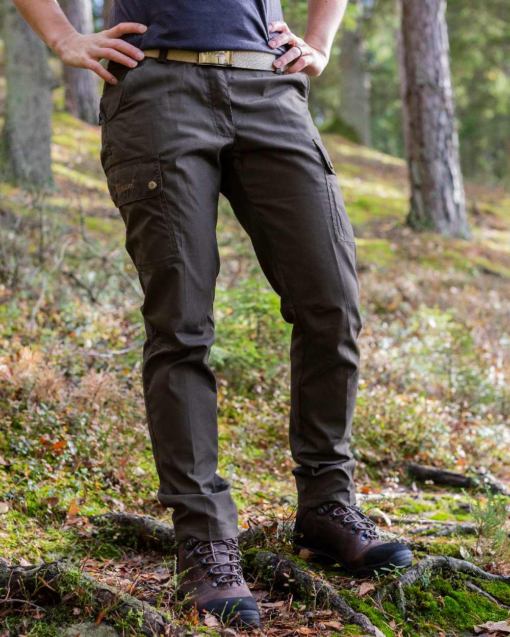 Dark Olive Coloured Pinewood Womens Finnveden Classic Trousers on outdoor background