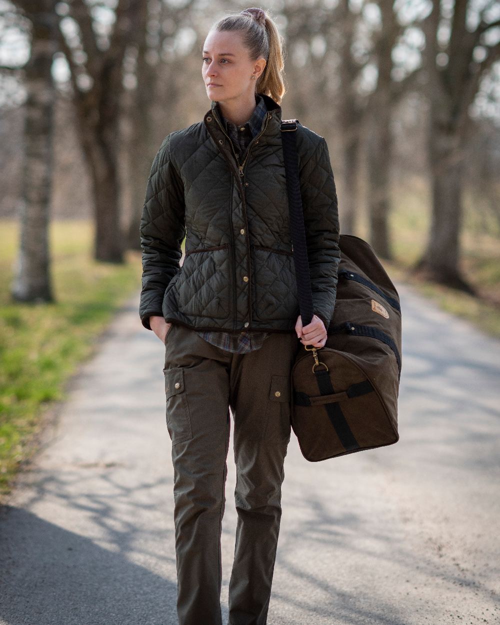 Dark Olive Coloured Pinewood Womens Finnveden Classic Trousers on outdoor background