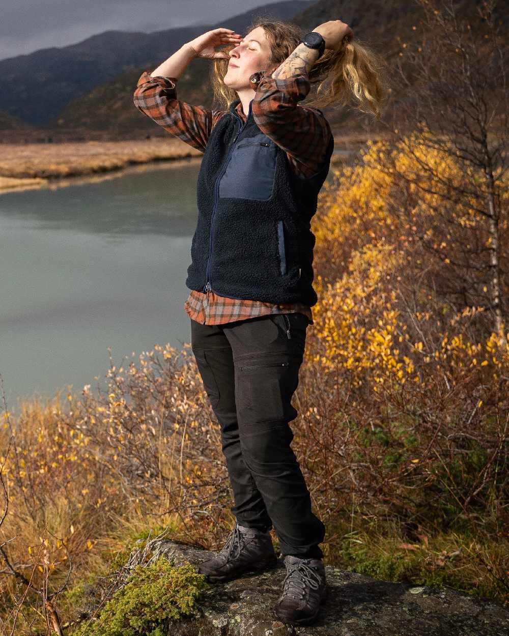 Black Coloured Pinewood Womens Finnveden Hybrid Trousers on outdoor background