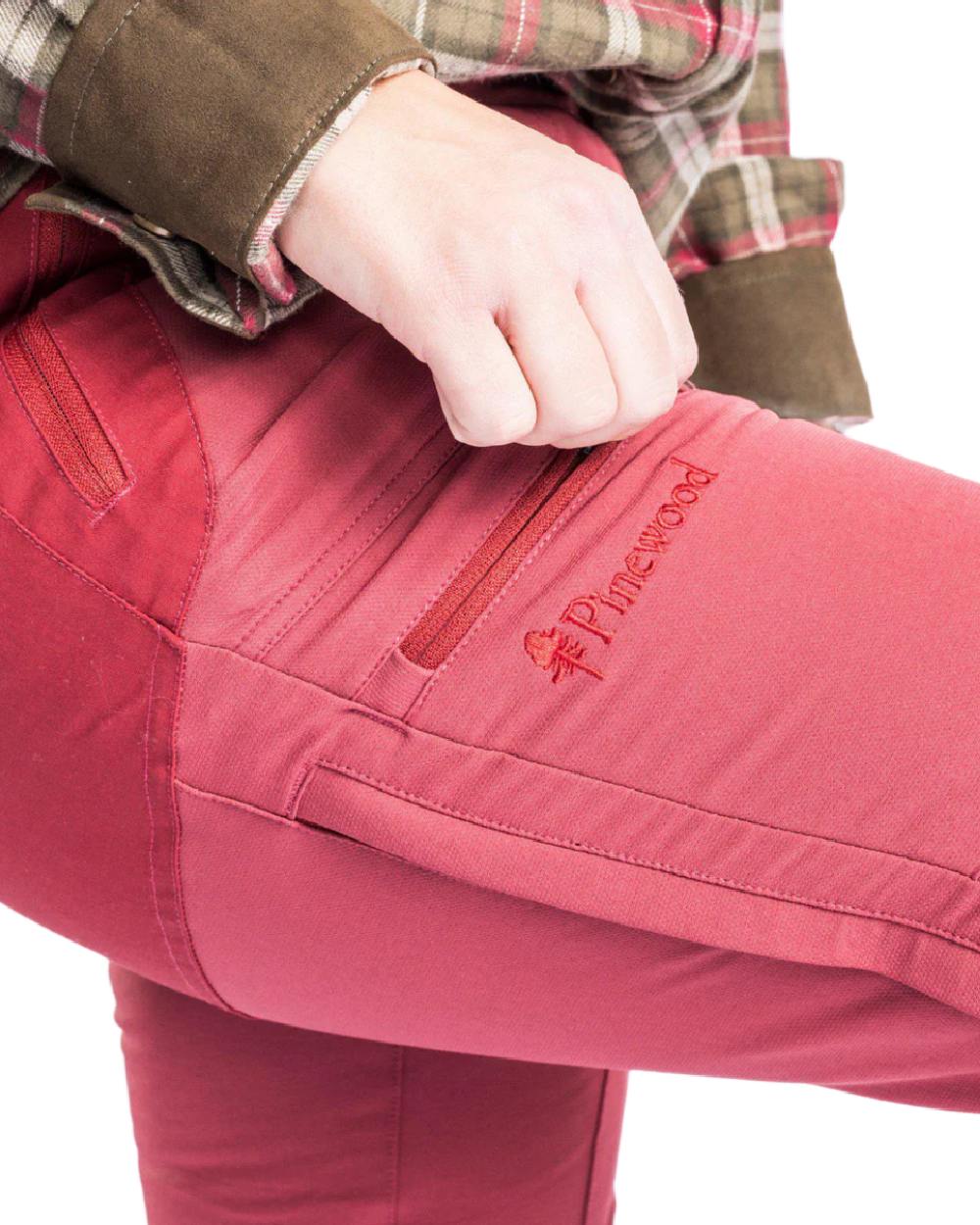 Dark Red Dark Tomato coloured Pinewood Womens Finnveden Hybrid Trousers on white background