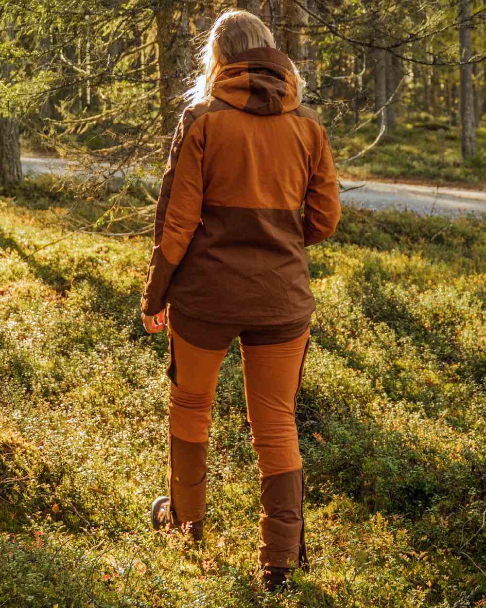 Fudge Nougat Coloured Pinewood Womens Finnveden Hybrid Trousers on outdoor background