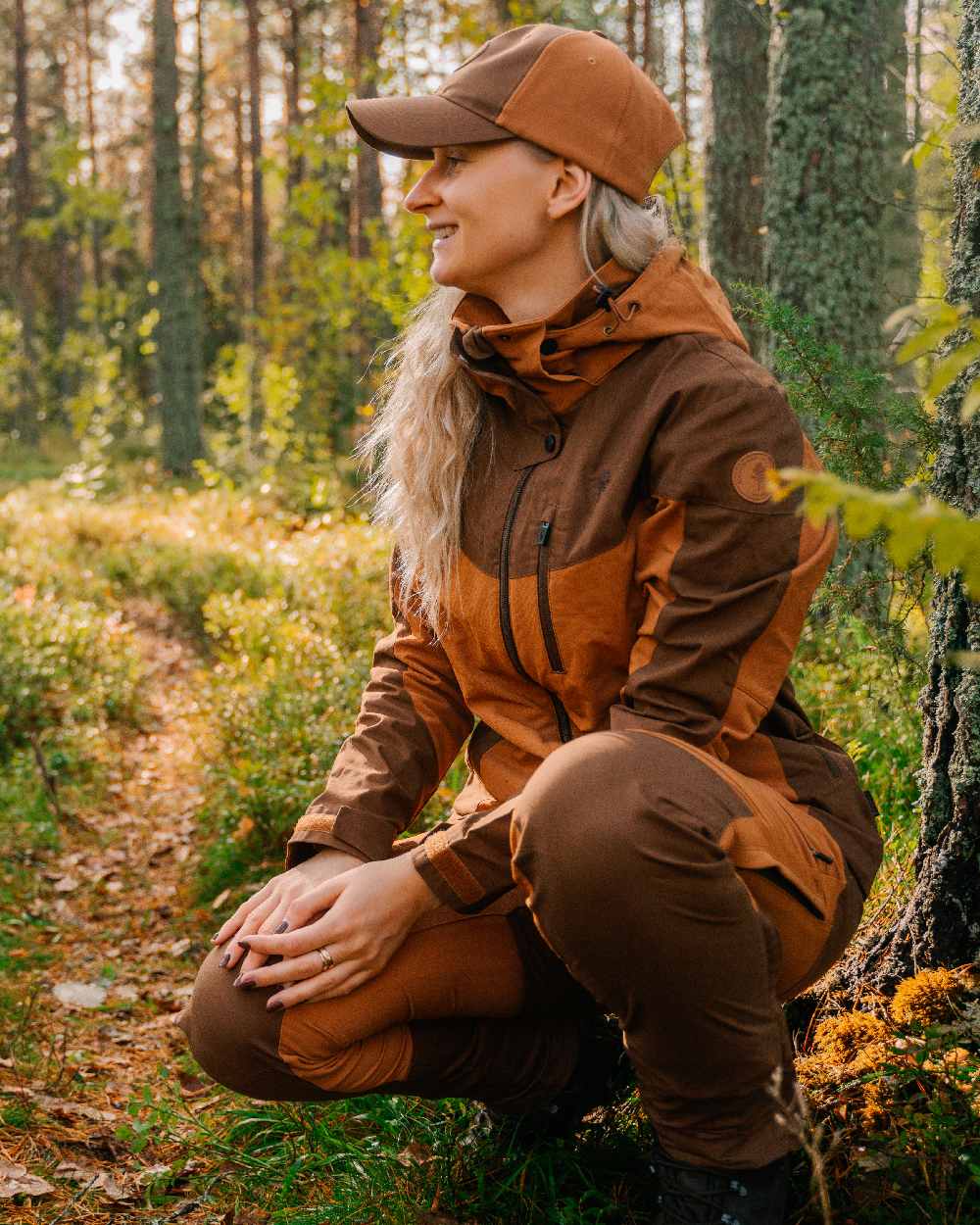 Fudge Nougat Coloured Pinewood Womens Finnveden Hybrid Trousers on outdoor background