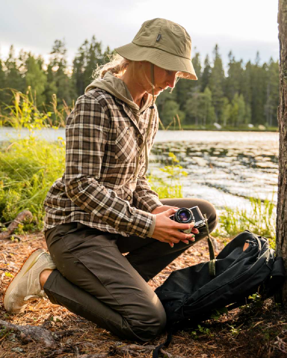 Dark Olive Coloured Pinewood Womens Finnveden Outdoor Trousers on outdoor background