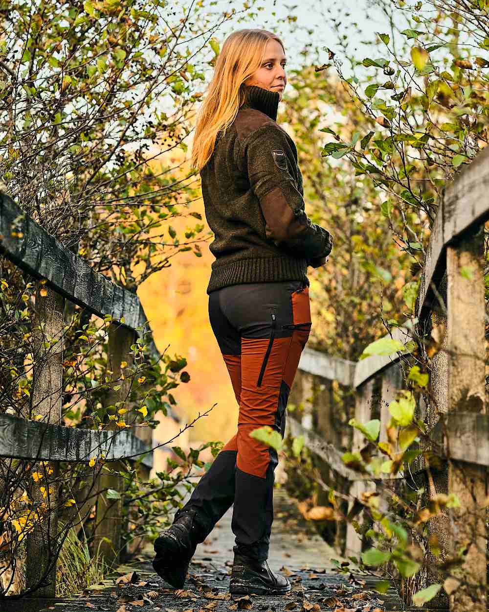 Dark Green Mel Coloured Pinewood Womens Hurricane Knitted Sweater on outdoor background