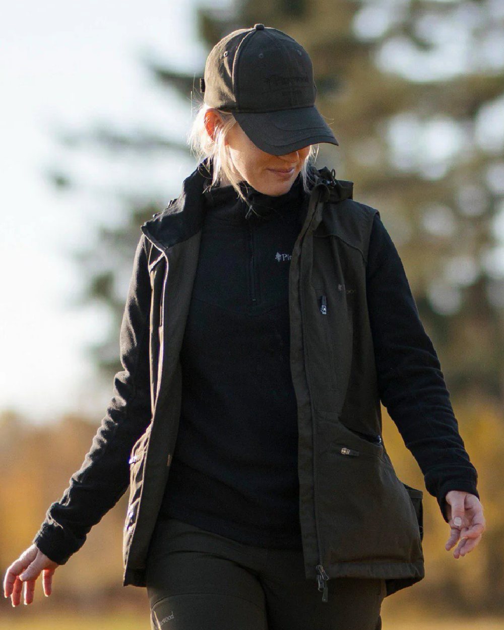 Black coloured Pinewood Womens Tiveden Fleece Sweater on blurry background